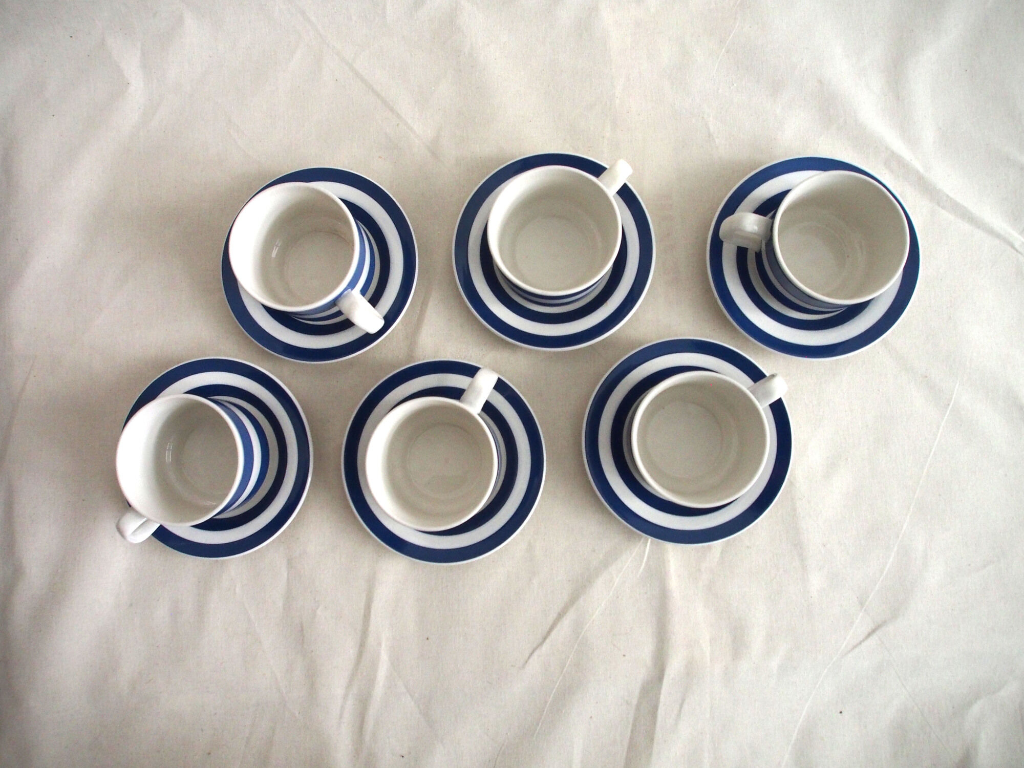 Series of 6 coffee cups in faience with blue stripes with saucers