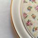 Vintage round trivet, ideal for adding a romantic touch.