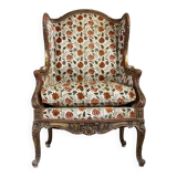 Regency style armchair in gilded wood