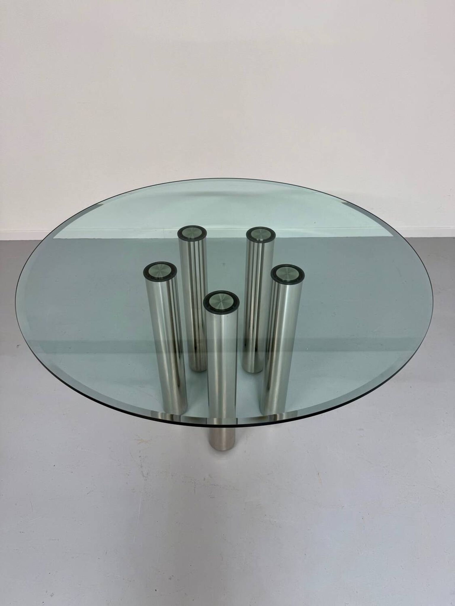 Round glass and metal dining table, Italian design from the 80s, vintage