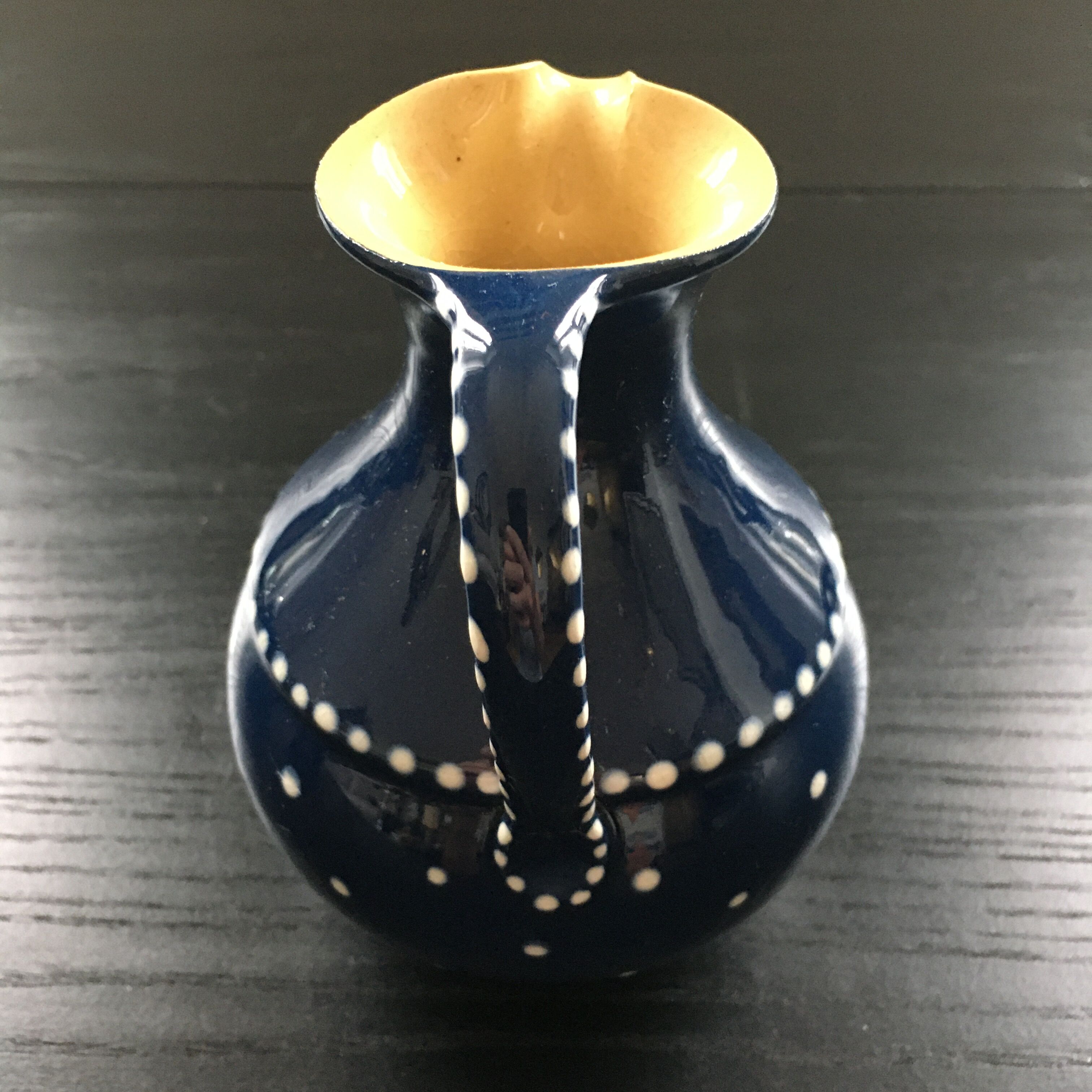 Midnight blue pitcher décor white polka dots