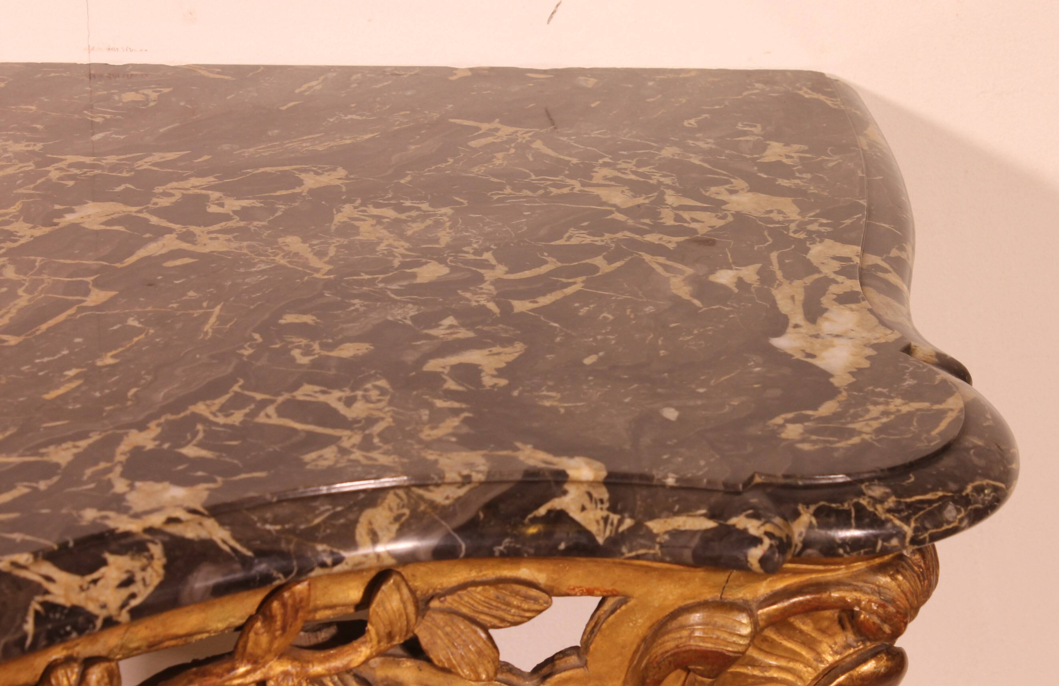 Louis XV period console in gilded wood