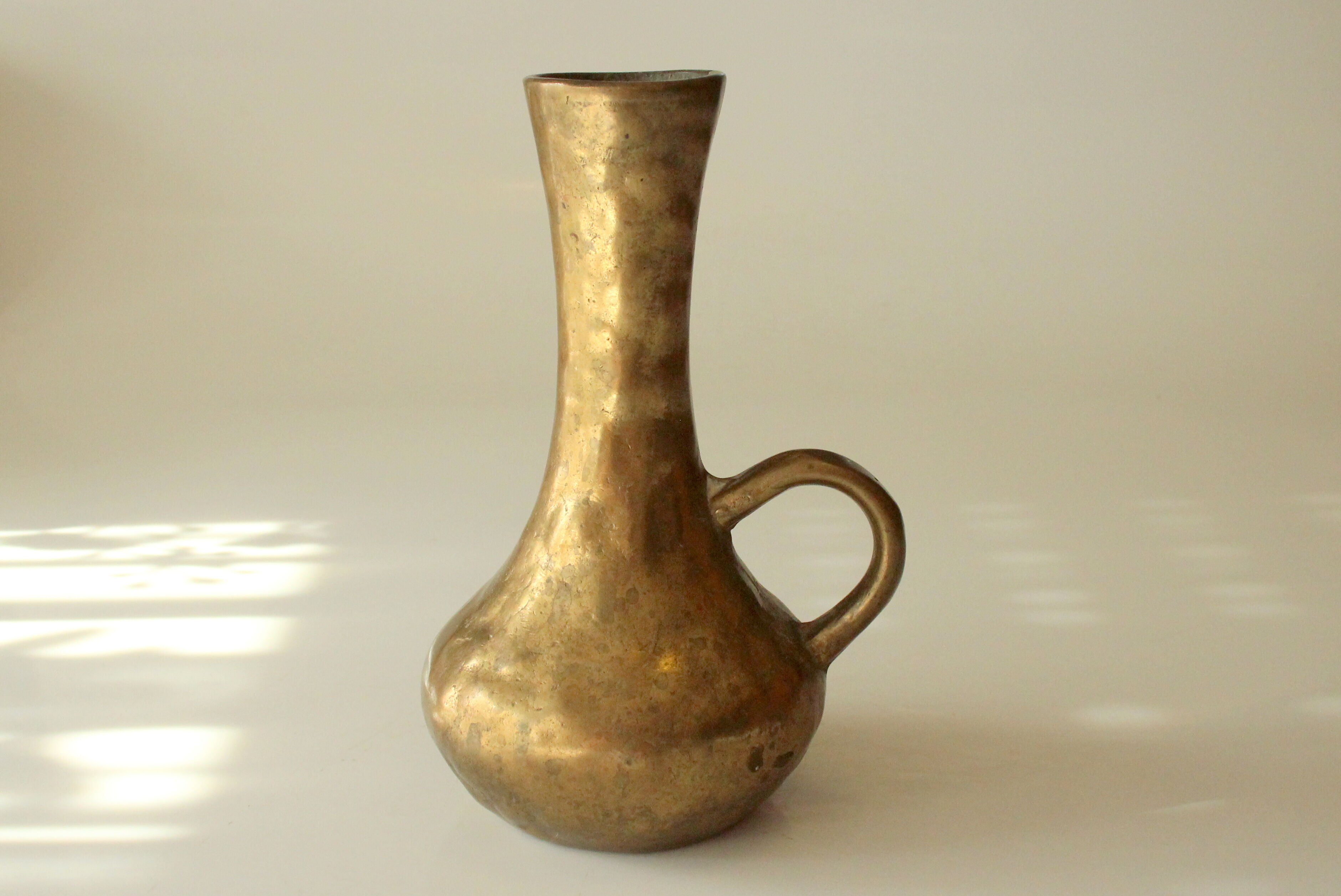 Solid  heavy brass vase in typical brutalism style