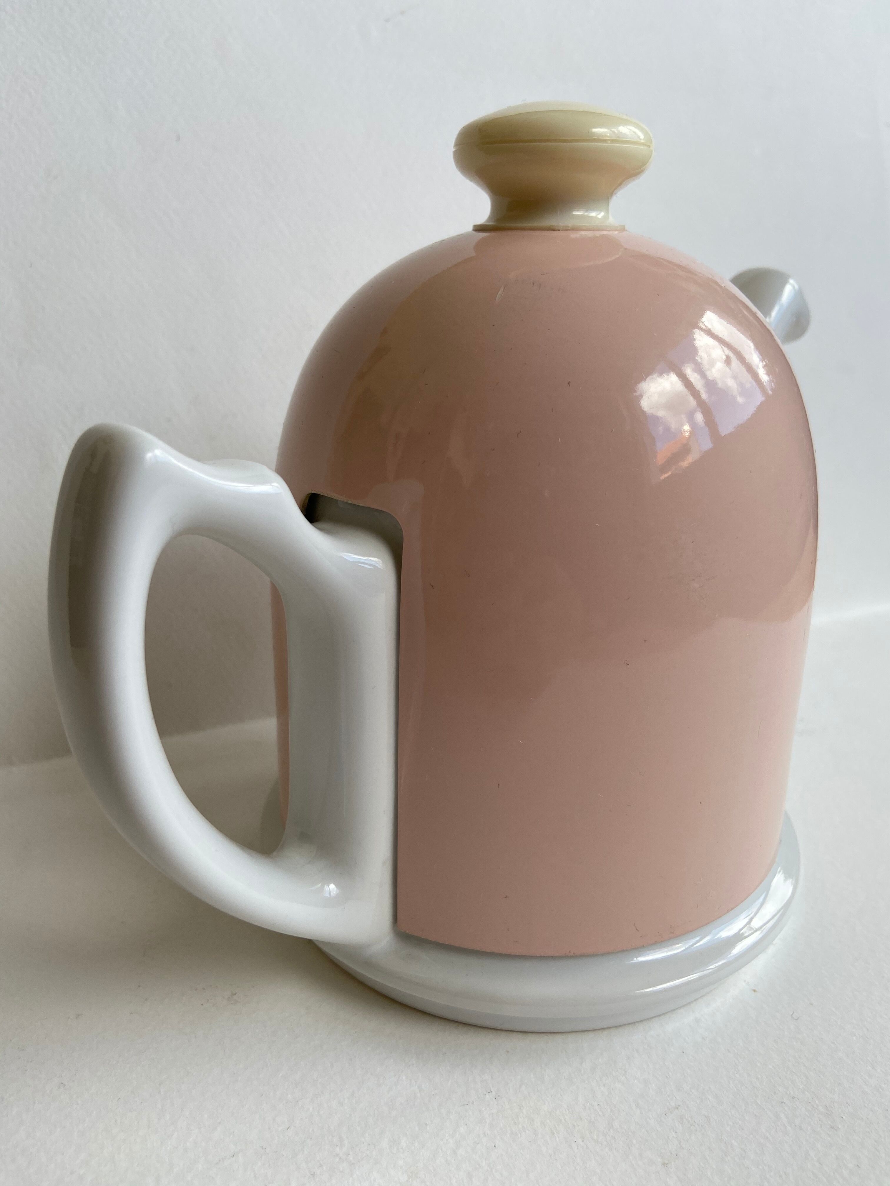 White teapot and powder pink