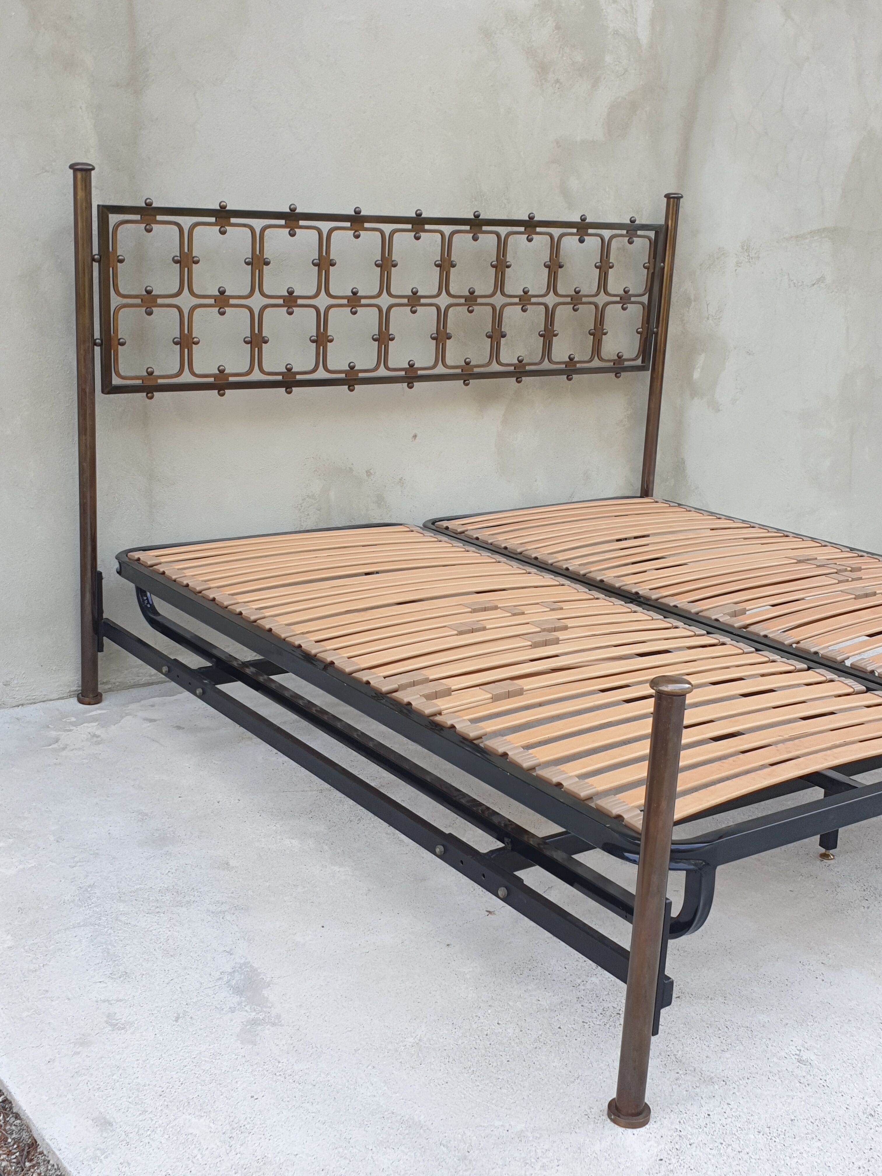 Double bed in burnished brass