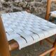 Set de 4 chaises dossier échelonné et assise tissée en coton blanc