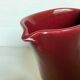 Old burgundy pitcher