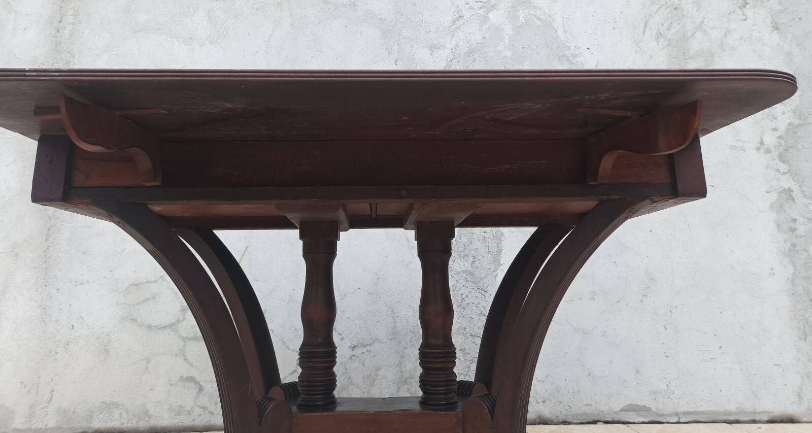 19th-century English style mahogany drop-leaf table.