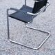 Fauteuil style MG5 tubes chromés assise et dossier cuir noir
