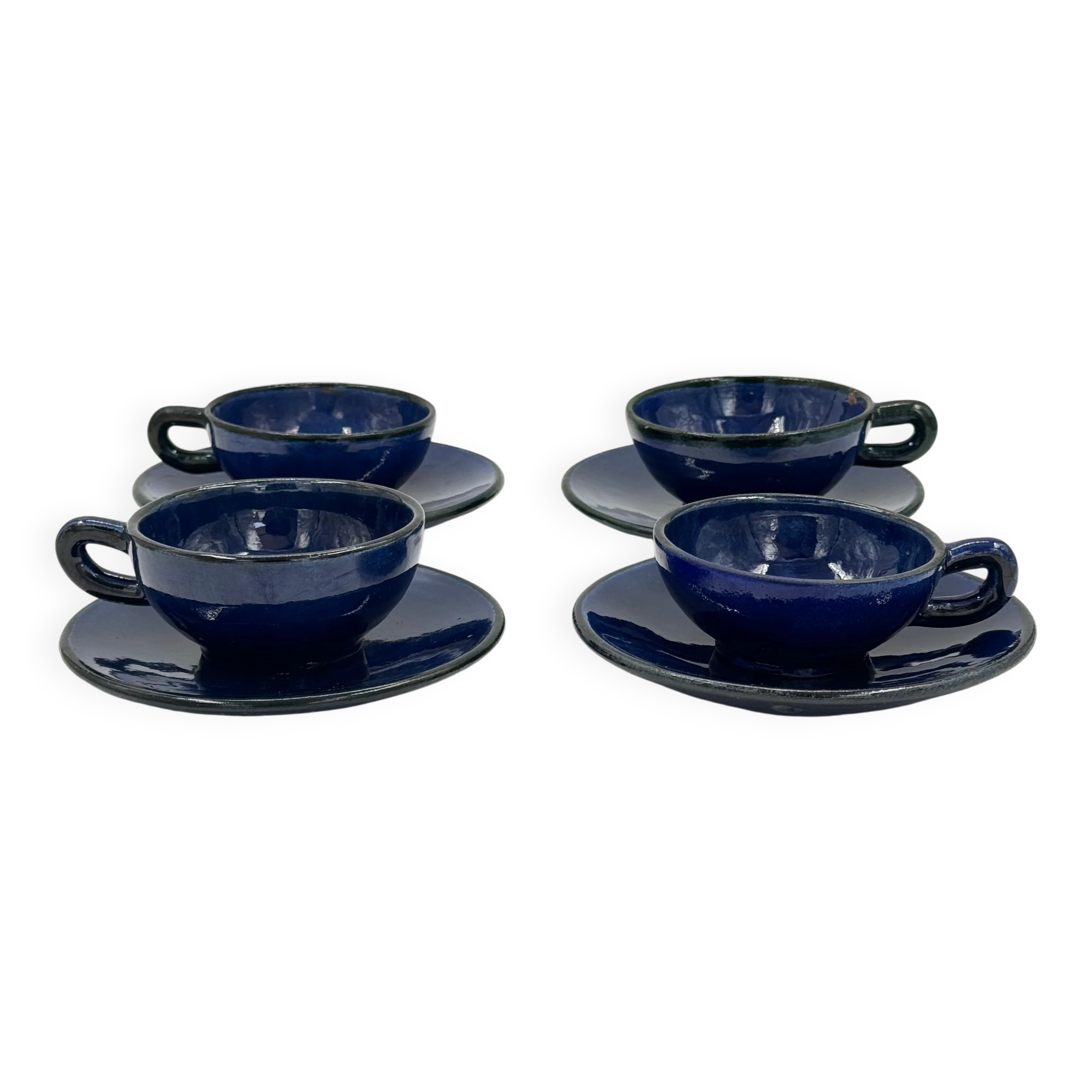 Set of 4 vintage ceramic cups and saucers, cobalt blue glaze.