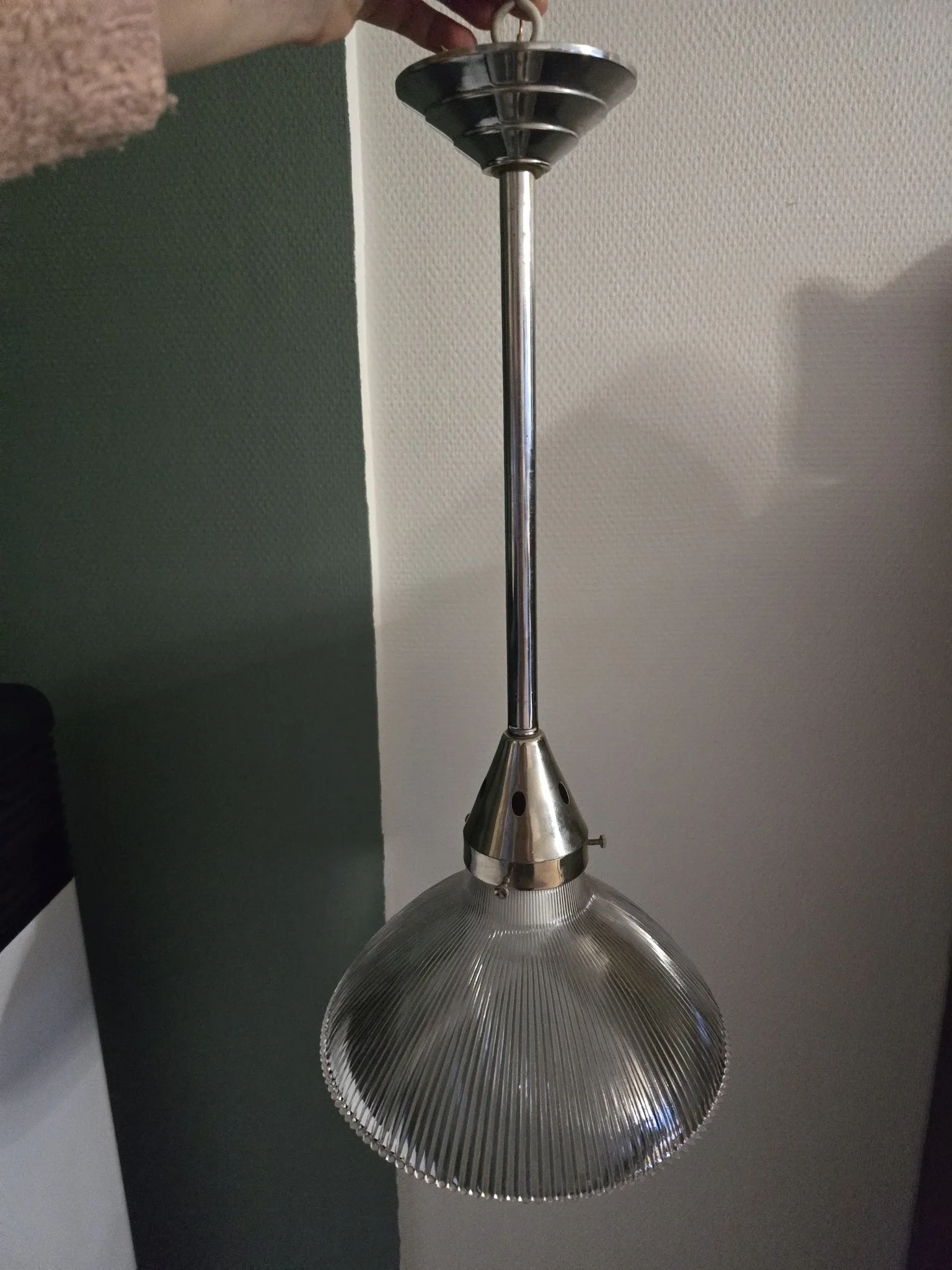 Vintage globe-style holophane on a chrome stem.