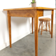 Vintage wooden dining table with formica top
