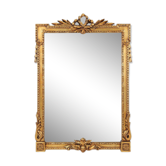 Highly decorated gilted carved wooden wall mirror, Belgium ca. 1950