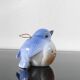 Vintage bird salt cellar in blue and white porcelain.
