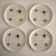 Suite de 4 assiettes "comet"