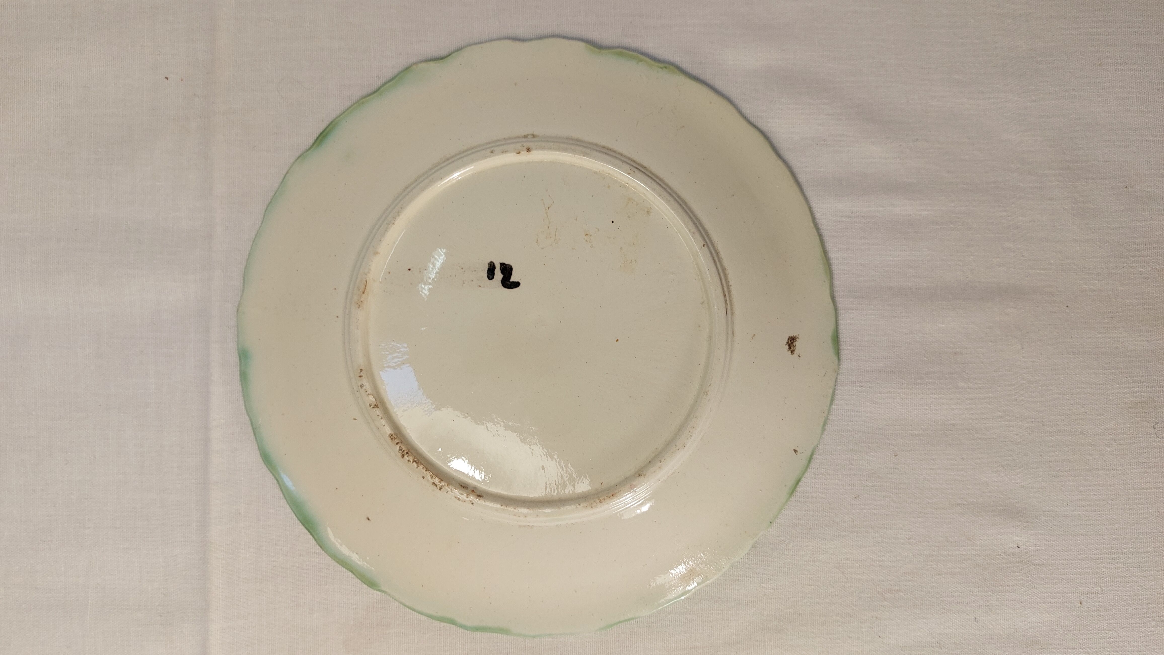 Set of two antique dessert plates in slip