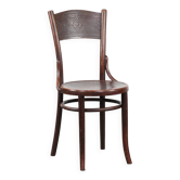 Chaise bistro en bois vintage intemporelle Cosmos avec de magnifiques sculptures.
