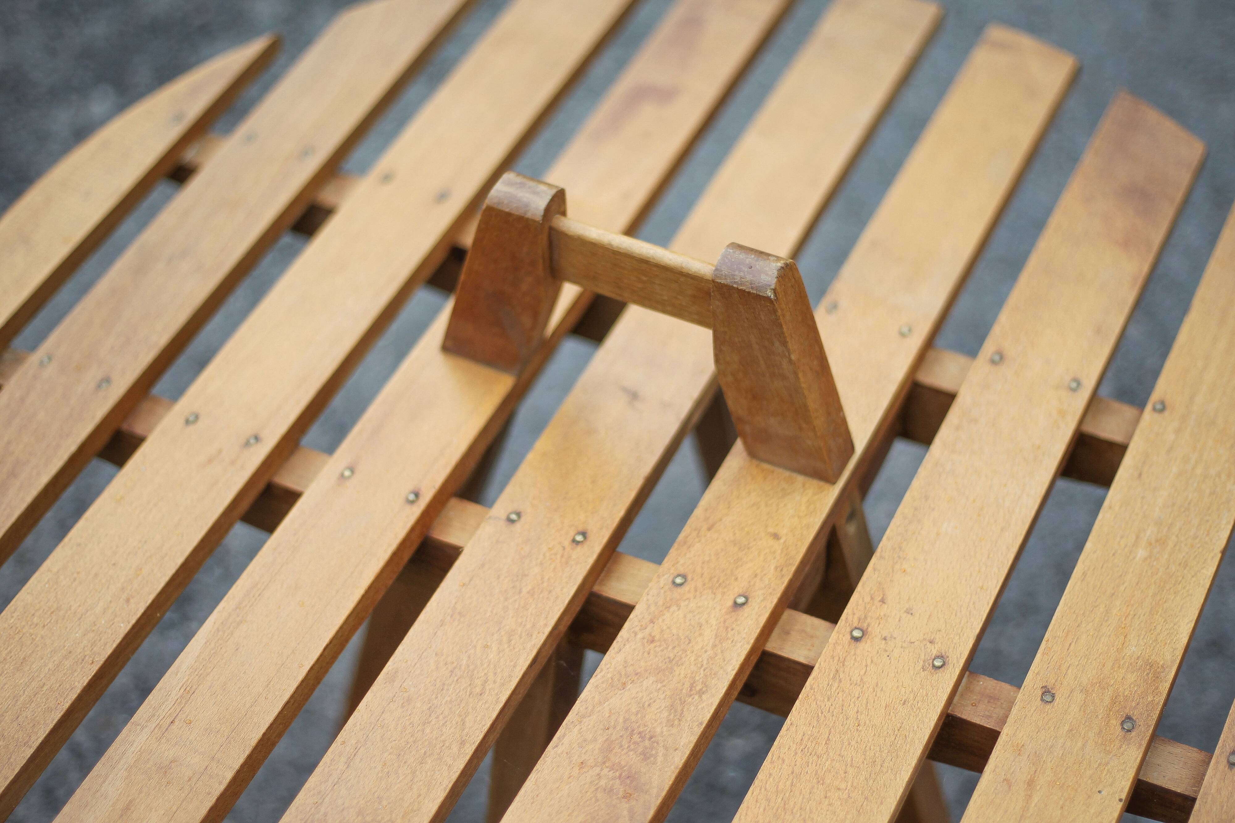 Vintage coffee table, wooden table with central handle, interior decoration, terrace, patio