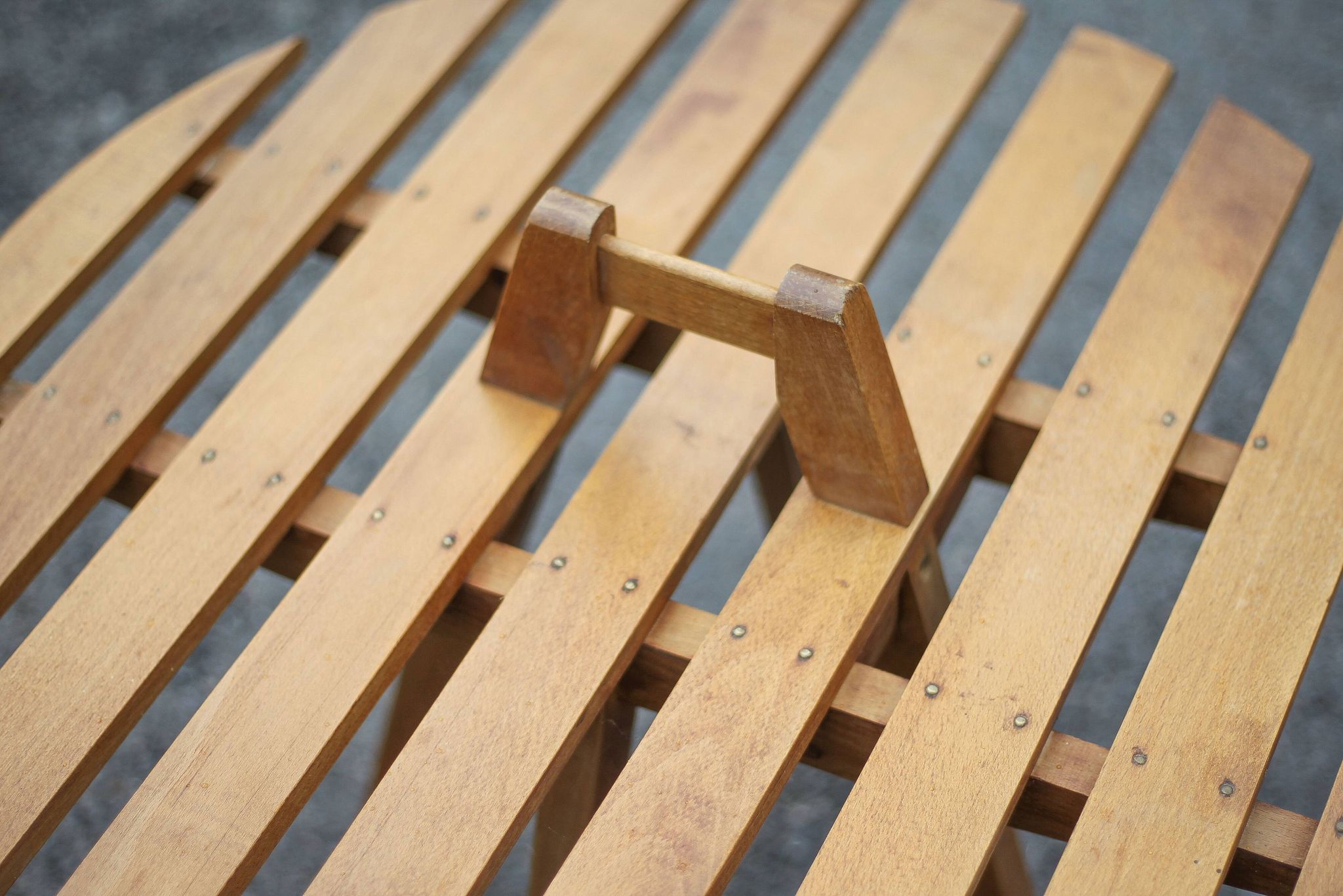 Vintage coffee table, wooden table with central handle, interior decoration, terrace, patio
