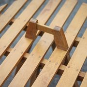 Vintage coffee table, wooden table with central handle, interior decoration, terrace, patio