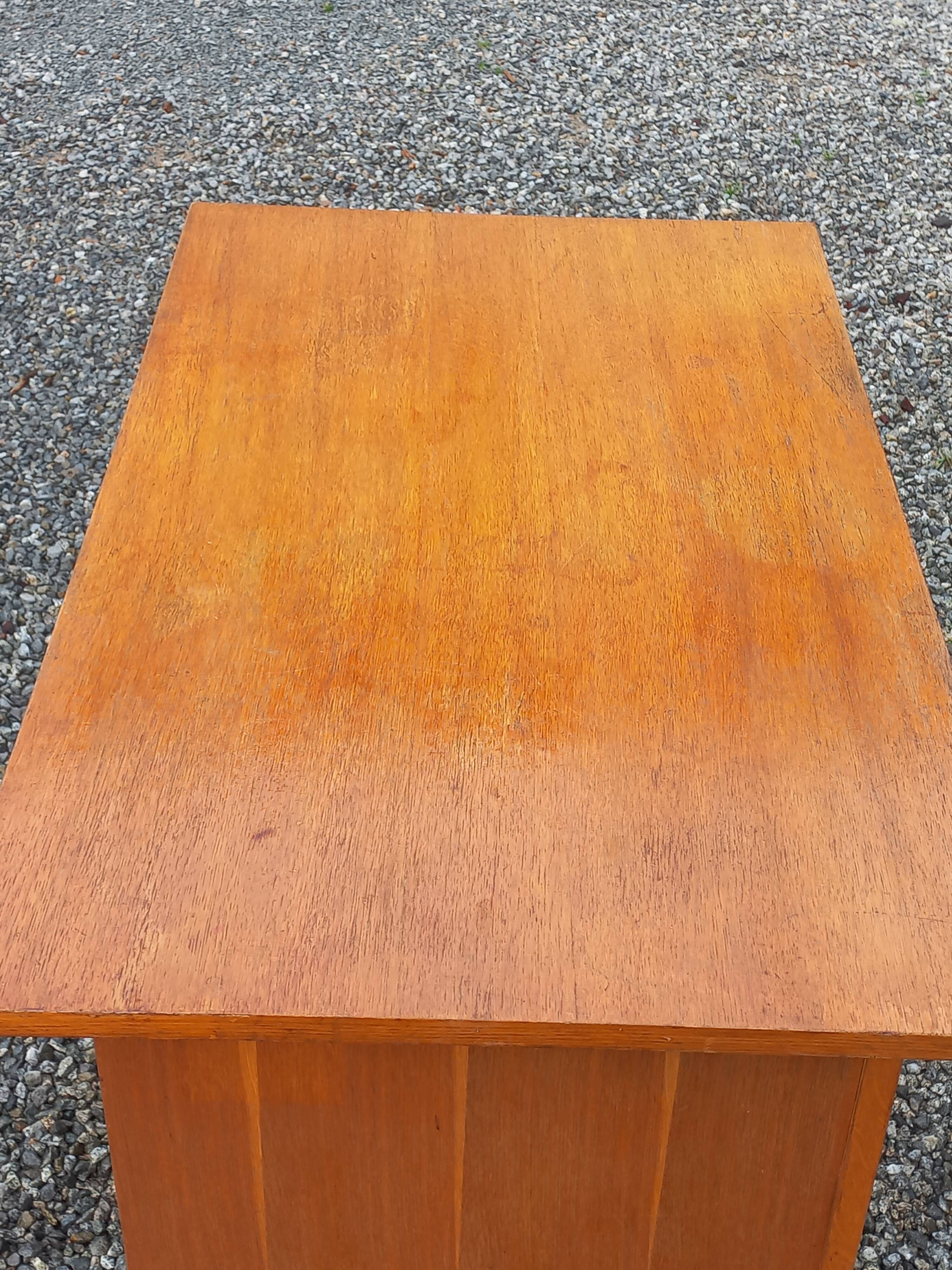 Vintage oak desk with a metallic base from the 1960s.