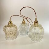 Cascade pendant light with 3 molded glass globes in vintage arabesque amber glass