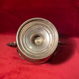 Antique sugar bowl on a stand with a lid and interior lining in velvet.