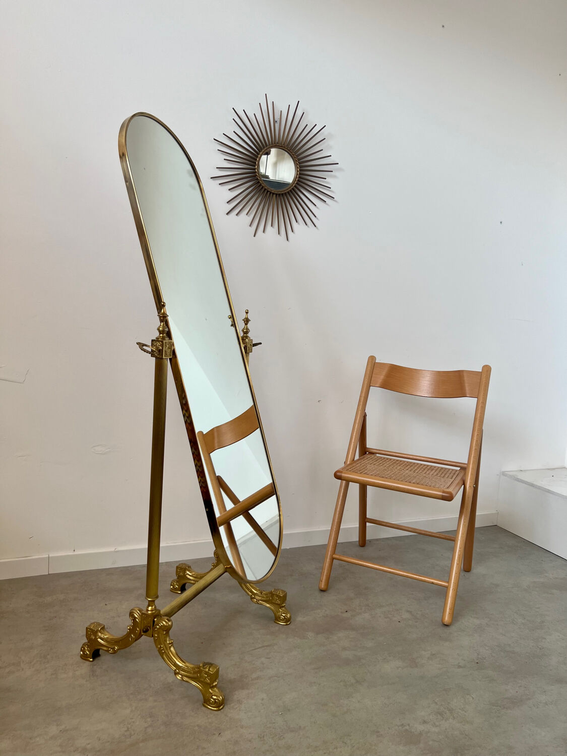 Old free-standing mirror in gilded brass in psychedelic neoclassical style Years 40 France