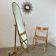 Old free-standing mirror in gilded brass in psychedelic neoclassical style Years 40 France