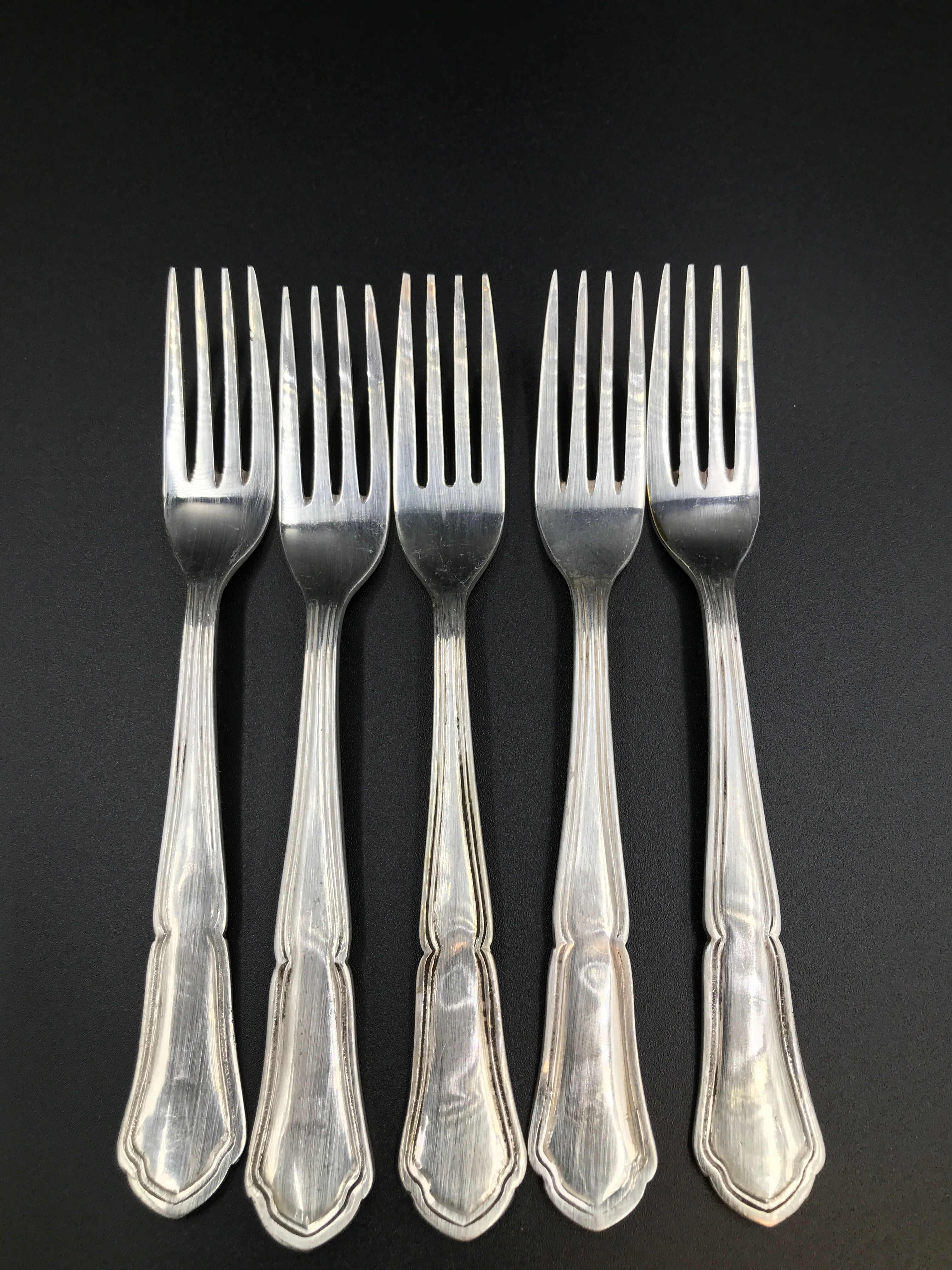 5 Small vintage metal silver forks