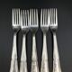 5 Small vintage metal silver forks