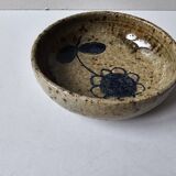 Ceramic bowl emptier with floral motif by suzanne dauliach