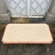 Table basse ancienne vintage en travertin et marbre rose