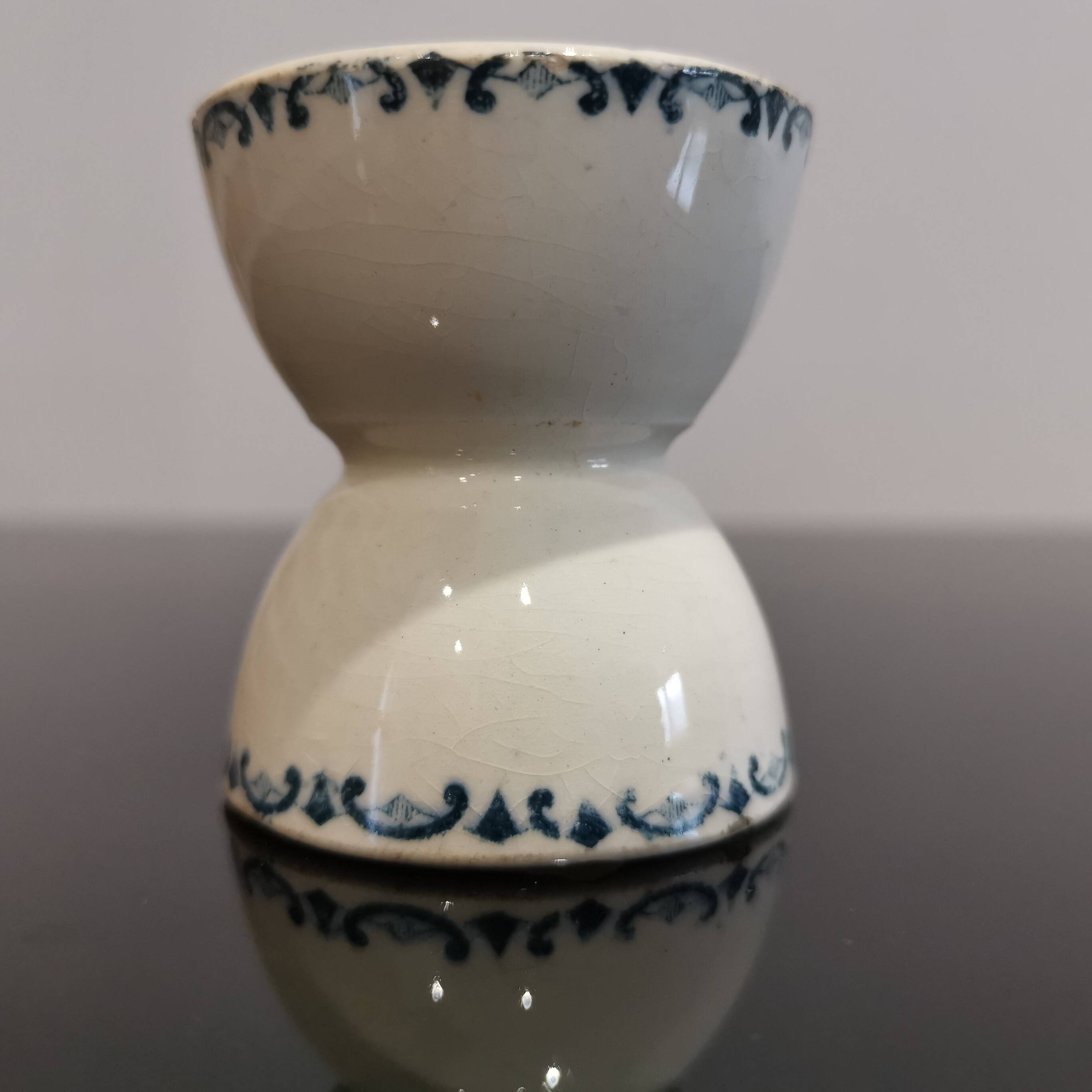Vintage blue earthenware egg cup