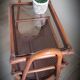Braided rattan side table and smoked glass