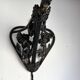 Art Nouveau wall light in wrought iron with vine decoration, early 20th century.