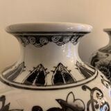 Pair of black and white ceramic vases