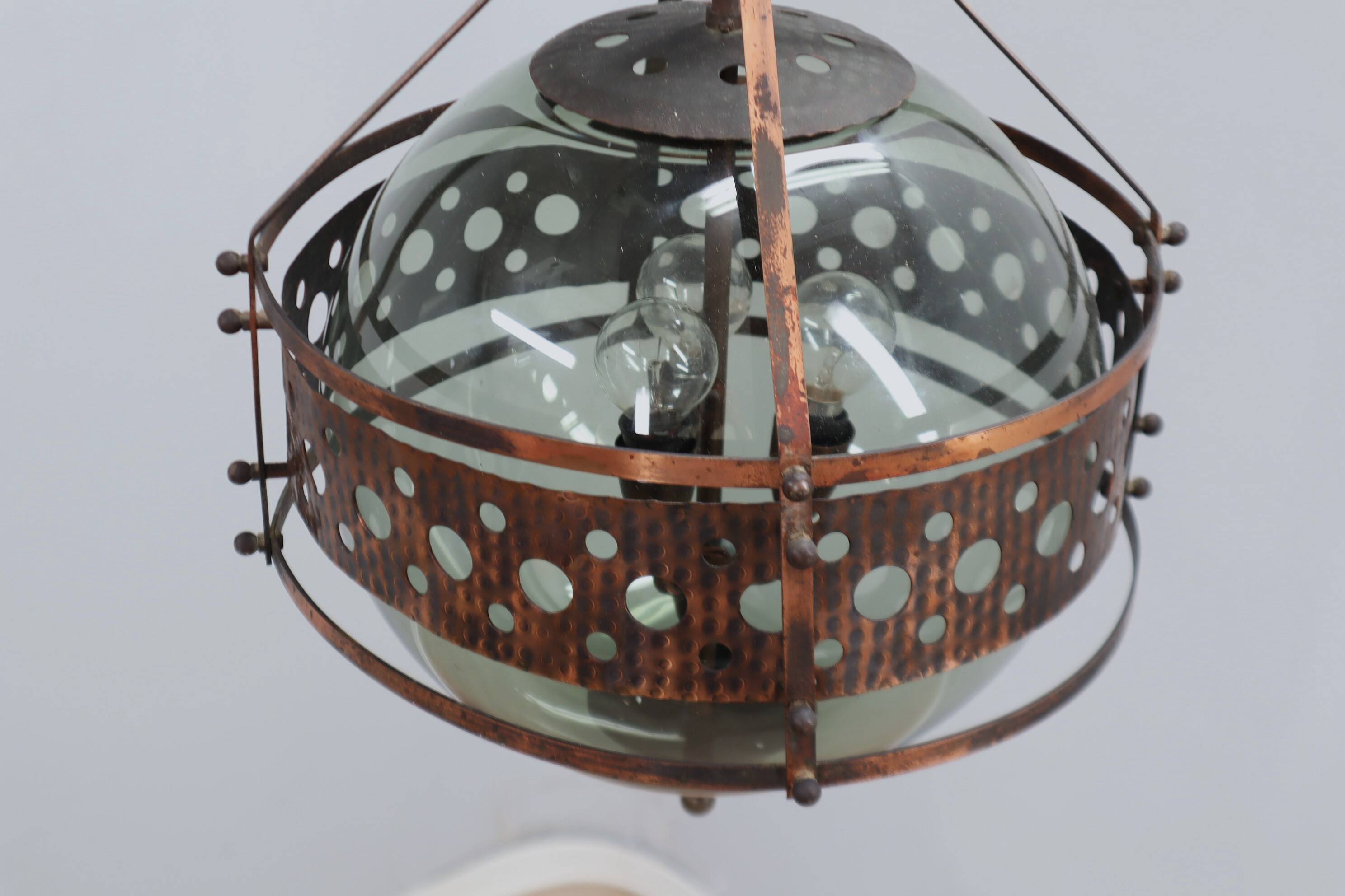 Pair of 1970s Brutalist Copper and Blown Glass Green Bottle Pendant Lamps