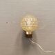 Wall light in rosewood with bobble glass ball shade.