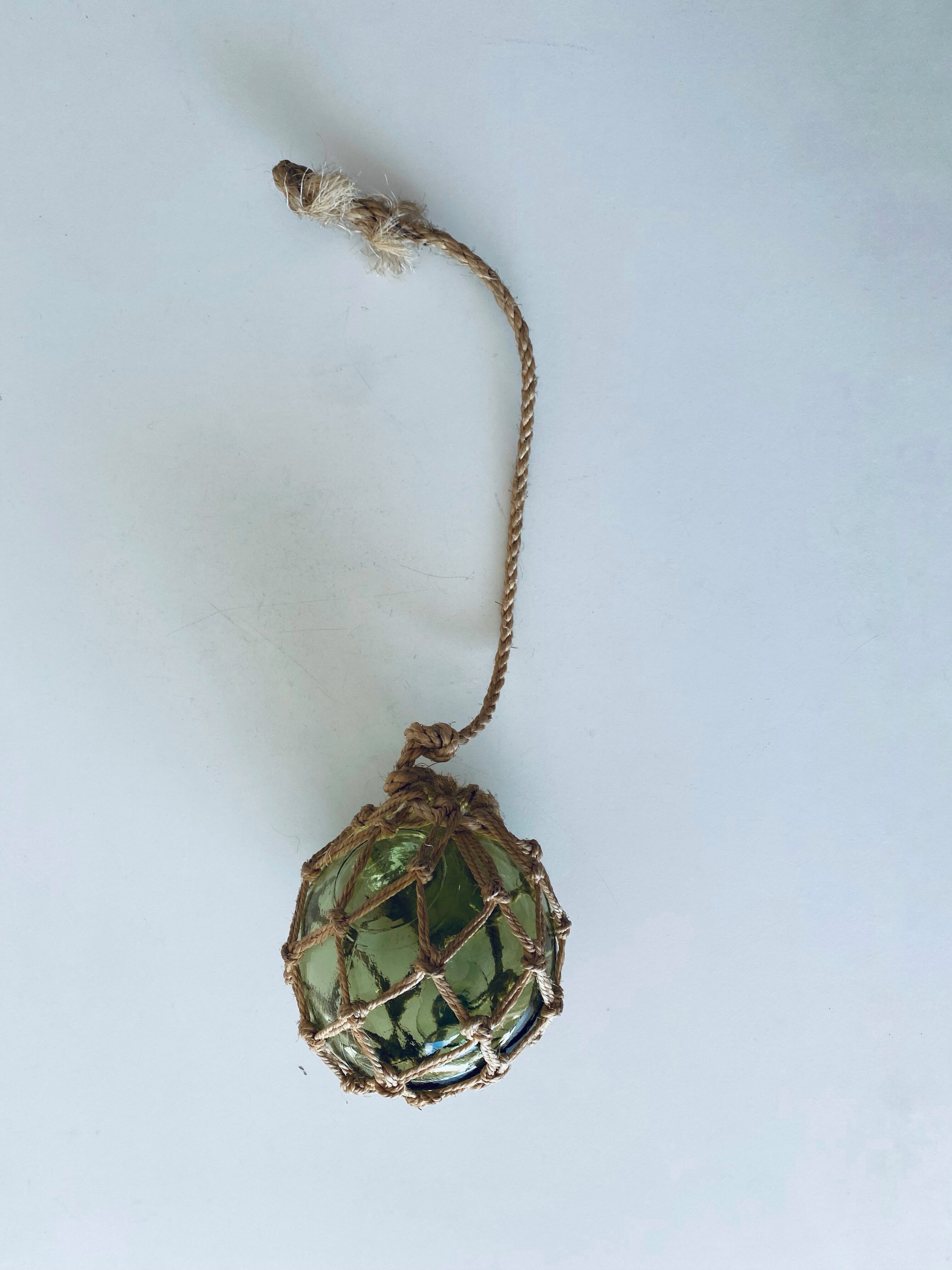 Antique fisherman's ball, old fishing floats