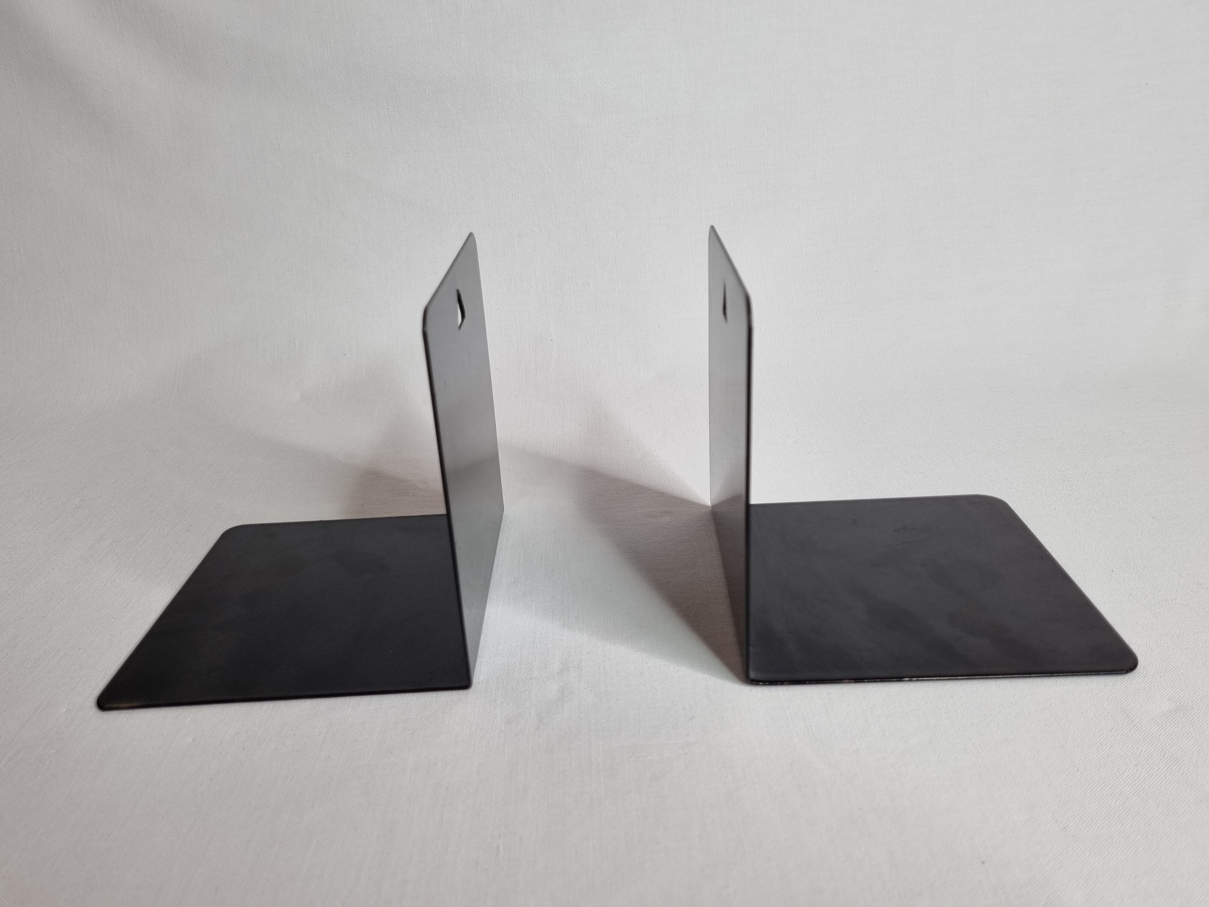Set of six vintage black lacquered steel bookhouses