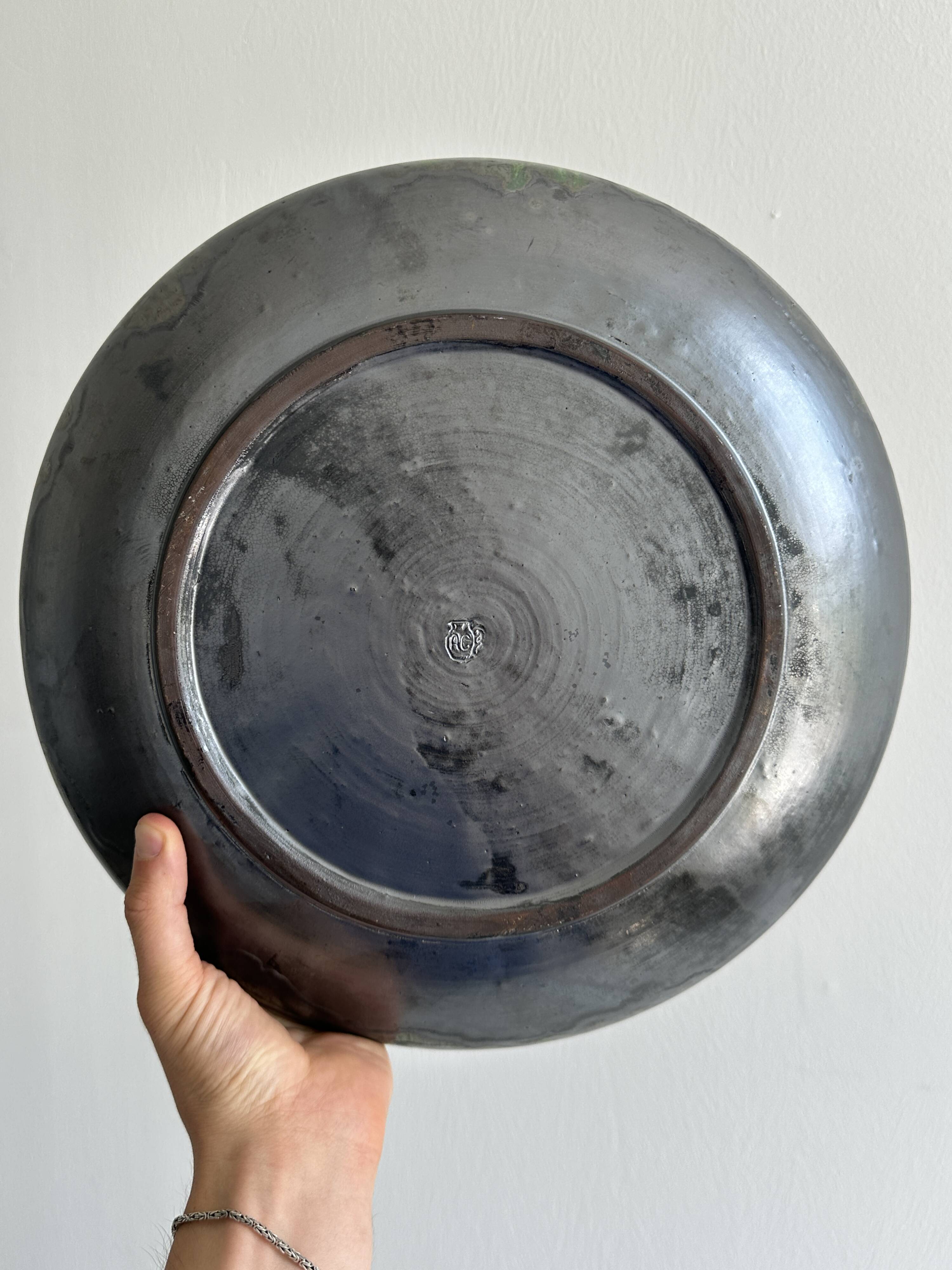 large colored terracotta ceramic dish