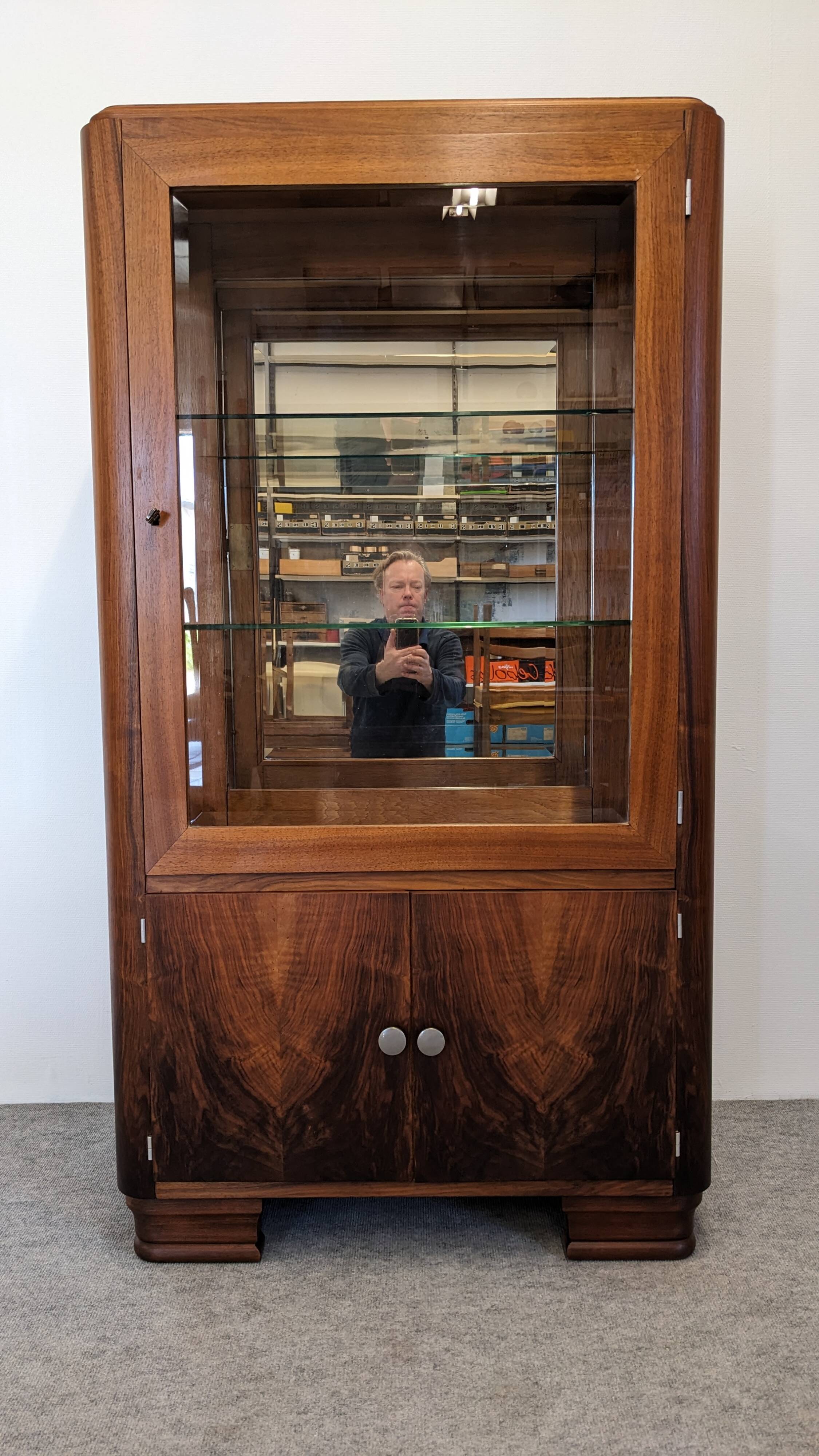 Art Deco walnut burl display cabinet, France circa 1930.
