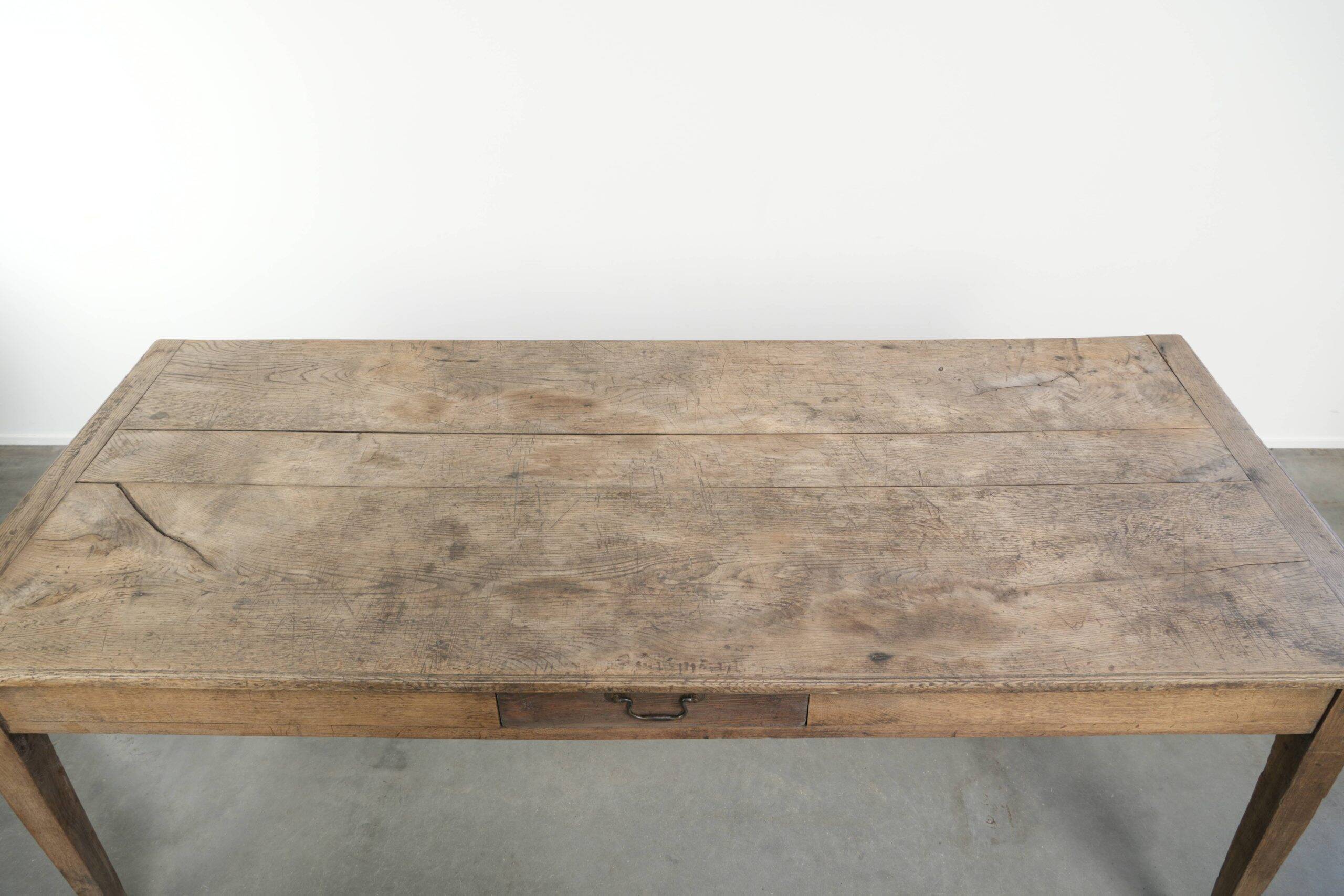 Antique French oak dining table for 6 to 8 people with a baguette drawer