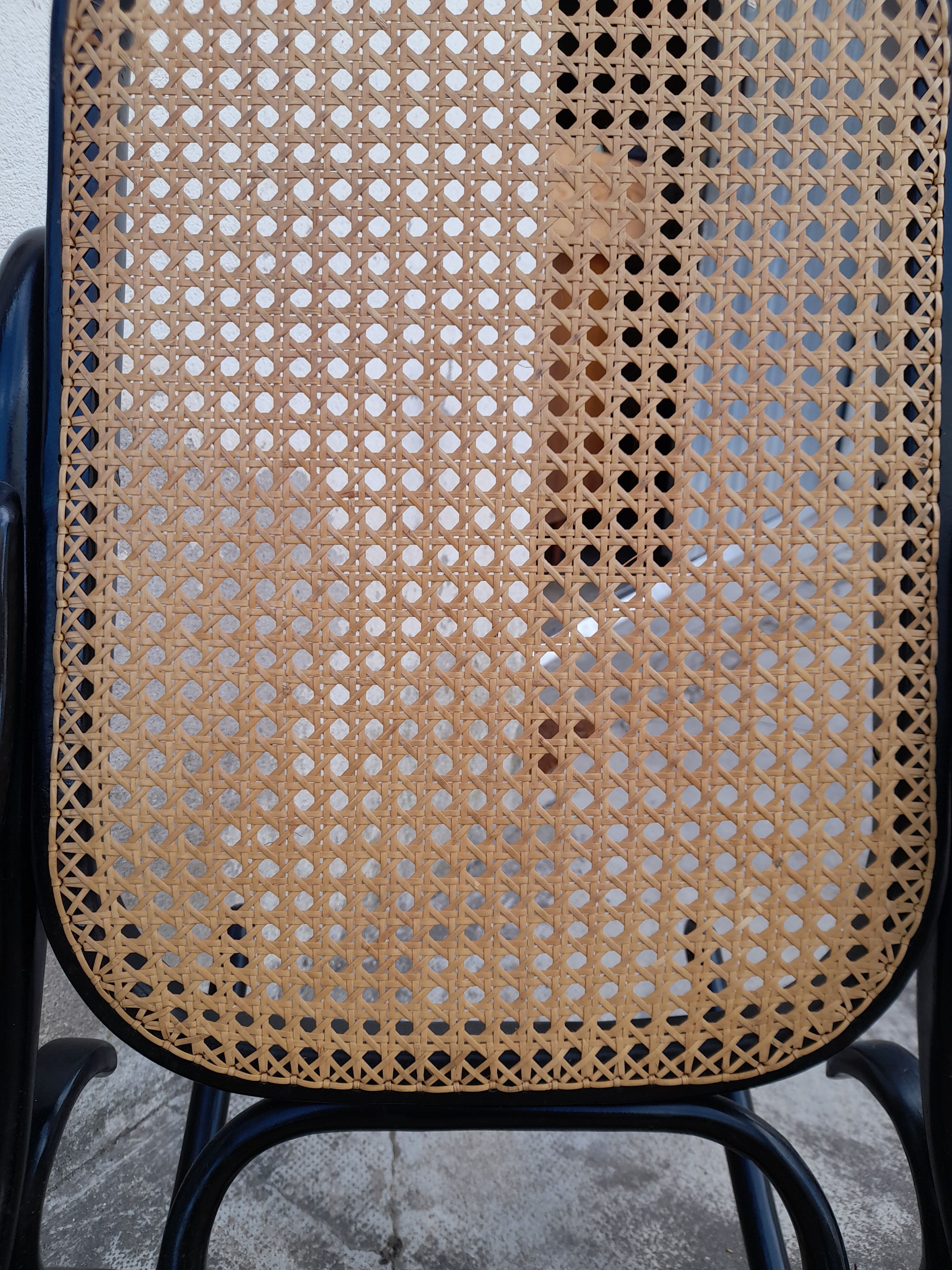 Rocking-chair noir canné bois courbé 1930