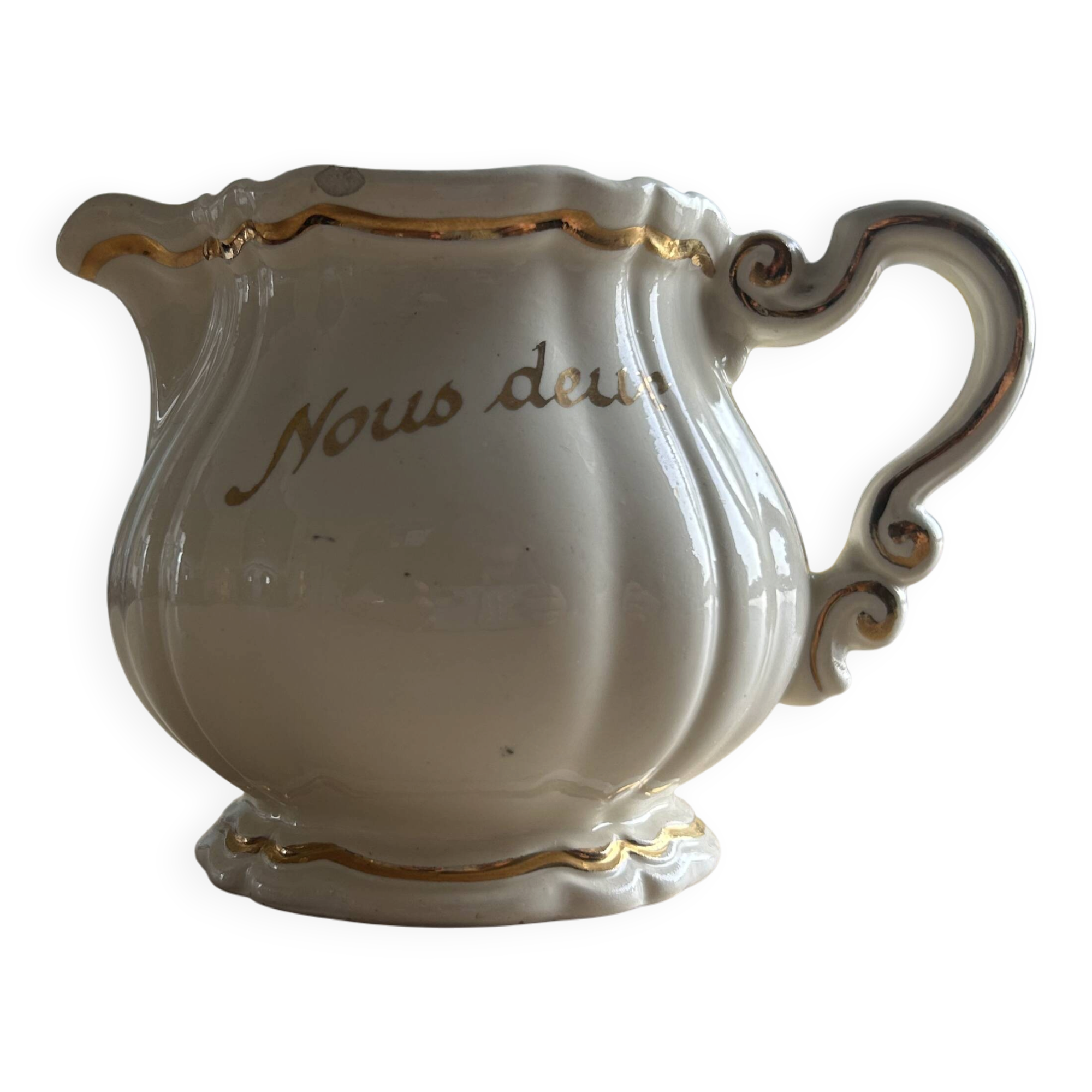 Old cream jug "Nous deux" in Sarreguemines earthenware.