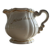 Old cream jug "Nous deux" in Sarreguemines earthenware.