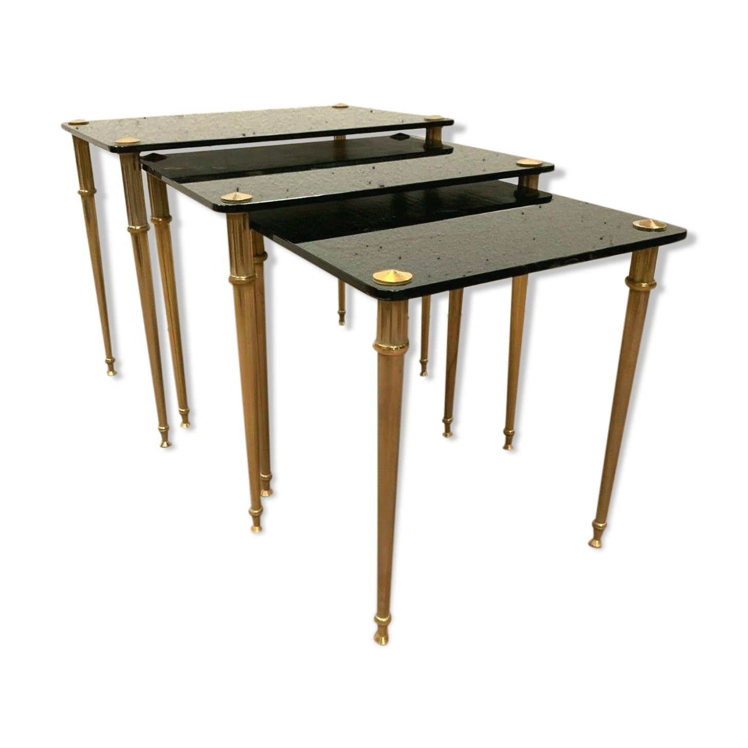 Pull out tables in brass and black glass XX century