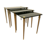 Pull out tables in brass and black glass XX century
