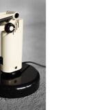 Beige plastic table lamp Lucifer, mid-century modern Scandinavian style.